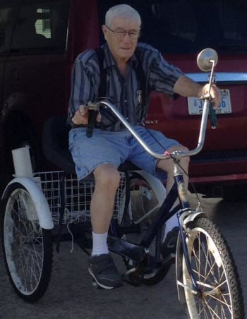 Carl Crawford riding a bike at 86
